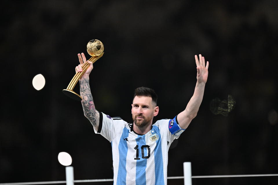 LUSAIL CITY, QATAR - DECEMBER 18: Lionel Messi of Argentina poses for a photo with the adidas Golden Ball award during the FIFA World Cup Qatar 2022 Final match between Argentina and France at Lusail Stadium on December 18, 2022 in Lusail City, Qatar. (Photo by Mustafa Yalcin/Anadolu Agency via Getty Images)