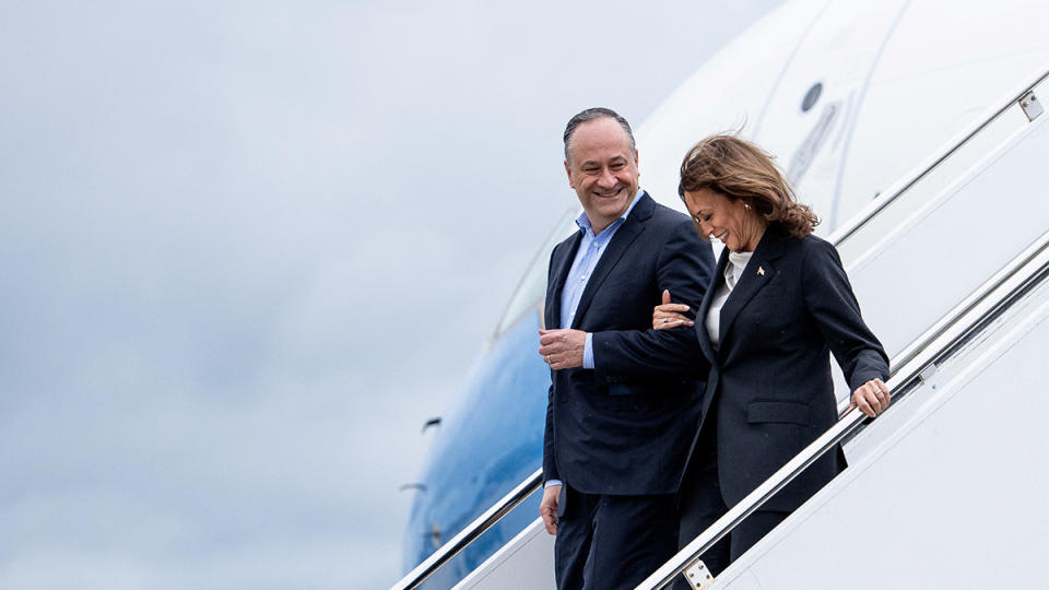 Kamala Harris and Doug Emhoff descend from Air Force Two