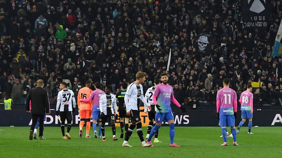 AC Milan players react after Maignan was racially abused by Udinese fans. - Jennifer Lorenzini/Reuters