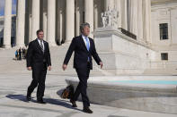 Nebraska Attorney General Mike Hilgers, right, and Missouri Attorney General Andrew Bailey walk to speak with members of the press outside the Supreme Court on Capitol Hill in Washington, Tuesday, Feb. 28, 2023, after the court heard arguments over President Joe Biden's student debt relief plan. (AP Photo/Patrick Semansky)