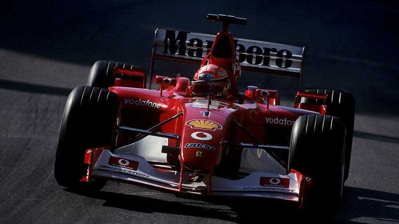 A photo of Michael Schumacher racing his 2002 Ferrari F1 car in Monaco. 