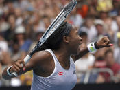 Cori "Coco" Gauff of the U.S. celebrates after defeating Romania's Sorana Cirstea during their second round singles match at the Australian Open tennis championship in Melbourne, Australia, Wednesday, Jan. 22, 2020. (AP Photo/Lee Jin-man)