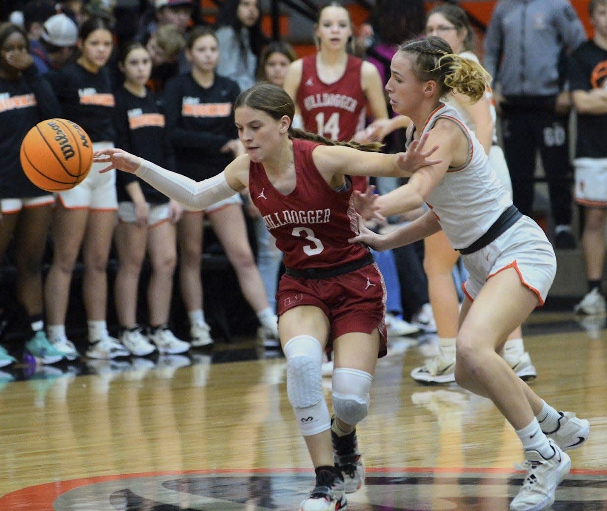 Dewey High School's Chanley Herren, left, is crowded by Pawhuska High's Hannah Reynolds during a varsity girls basketball showdown on Feb. 10, 2023, in Pawhuska