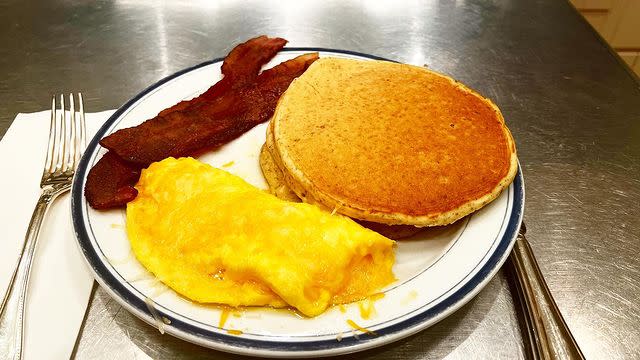 <p>The <em>Today</em> host infamously makes breakfast for his son Nick every morning. On March 3, it was a homemade version of Denny's infamous Grand Slam breakfast, with an egg omelet, pancakes, and bacon. "When I left, Mr. Nick was in the midst of his <a href="https://www.instagram.com/onepeloton/" rel="nofollow noopener" target="_blank" data-ylk="slk:@onepeloton;elm:context_link;itc:0;sec:content-canvas" class="link ">@onepeloton</a> ride, so I have my version of the Grand Slam," he wrote. </p>