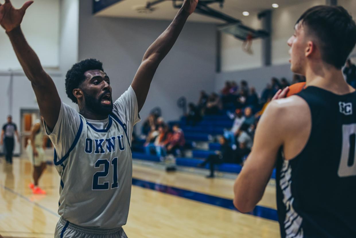 OKWU's Valentin Van Putten intensely defends the inbound pass during a game vs. Southwestern.