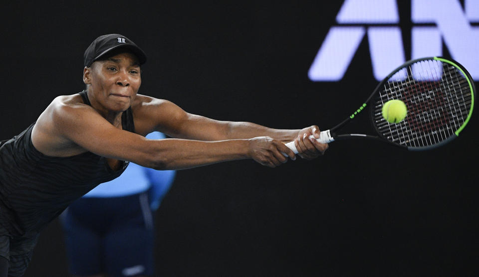 United States' Venus Williams makes a backhand return to Petra Kvitova of the Czech Republic during a tuneup tournament ahead of the Australian Open tennis championships in Melbourne, Australia, Tuesday, Feb. 2, 2021. (AP Photo/Andrew Brownbill)