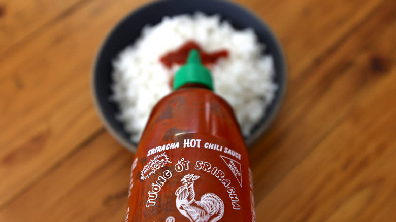 Sriracha on bowl of food