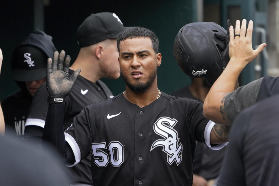 Chicago White Sox's Lenyn Sosa (50) celebrates scoring against the Detroit Tigers in the sixth inning of a baseball game, Sunday, Sept. 10, 2023, in Detroit. (AP Photo/Paul Sancya)