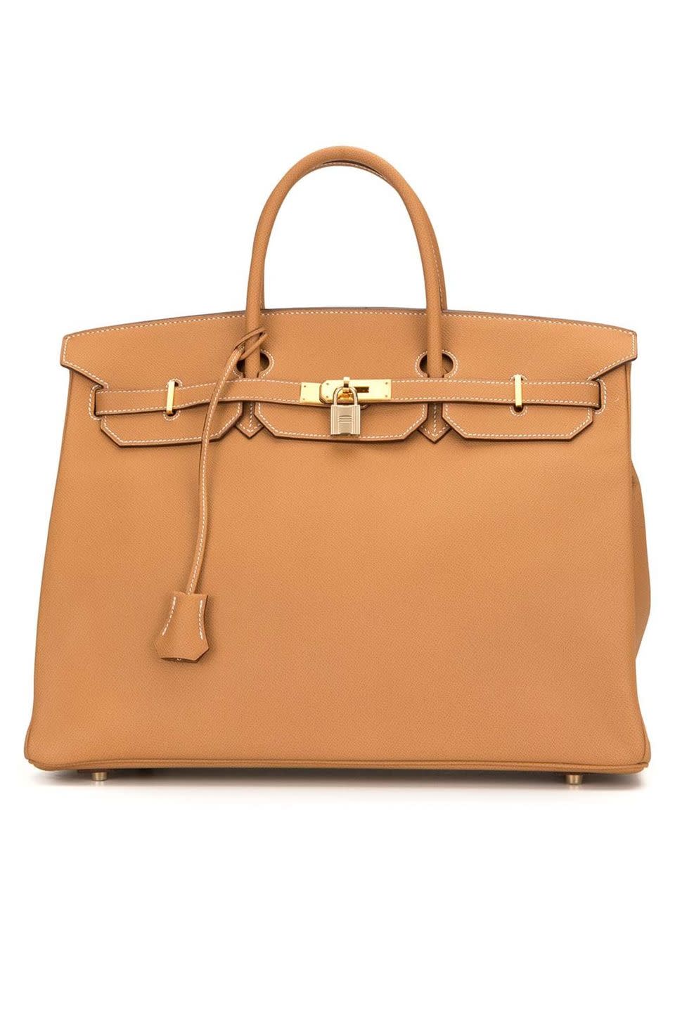 <p><a class="link " href="https://www.farfetch.com/uk/shopping/women/hermes-2006-pre-owned-birkin-45-bag-item-16194411.aspx?storeid=10031" rel="nofollow noopener" target="_blank" data-ylk="slk:SHOP NOW;elm:context_link;itc:0;sec:content-canvas">SHOP NOW</a></p><p>Now here is a bag that needs no introduction; the Hermès Birkin, one of the most famous handbags of all time and one that is usually very difficult to get your hands on. However, Farfetch's vintage offering is currently selling a pre-owned Birkin from 2006, which probably won't be hanging around for long.</p><p>Leather bag, £17,519, Vintage Hermès at <a href="https://www.farfetch.com/uk/shopping/women/hermes-2006-pre-owned-birkin-45-bag-item-16194411.aspx?storeid=10031" rel="nofollow noopener" target="_blank" data-ylk="slk:Farfetch;elm:context_link;itc:0;sec:content-canvas" class="link ">Farfetch</a> </p>
