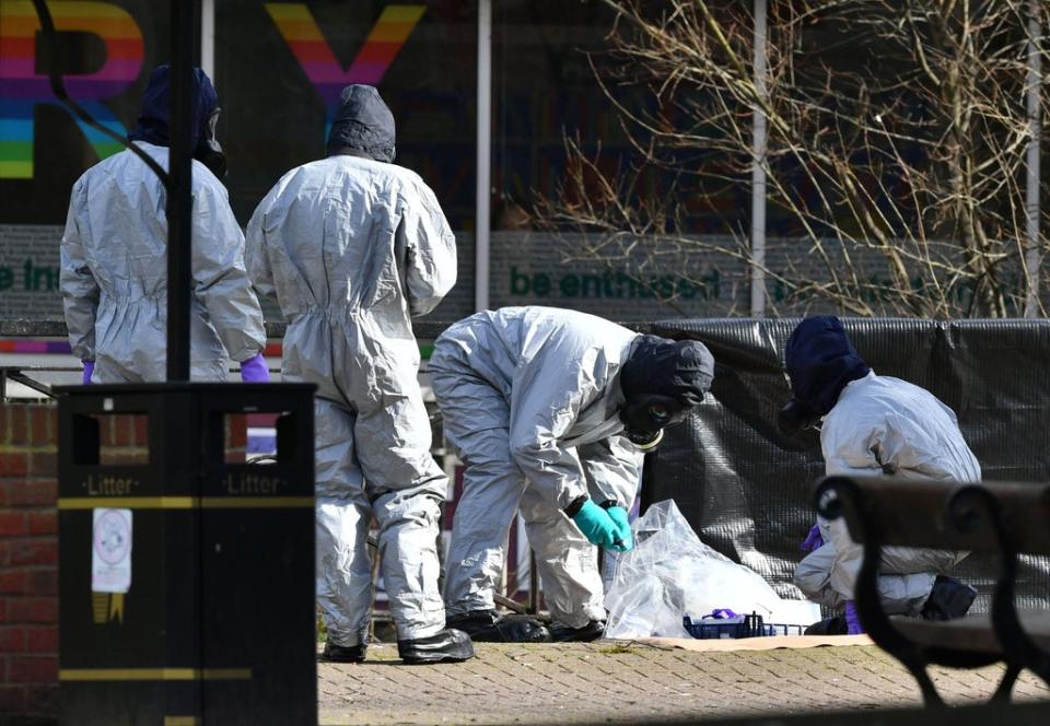 Police in protective suits working near to the scene in the Maltings shopping centre in Salisbury, where former Russian double agent Sergei Skripal and his daughter Yulia, were found critically ill by exposure to Novichok nerve agent (Ben Birchall/PA) (PA Wire)