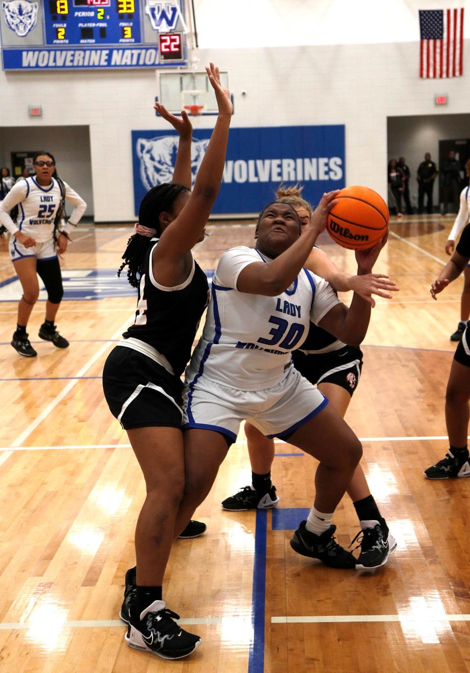 Woodville Tompkins' Destiney Edwards is double teamed by Bryan County's Soniya Whitaker and Katelyn King during the Region 3A Division 1 title game.