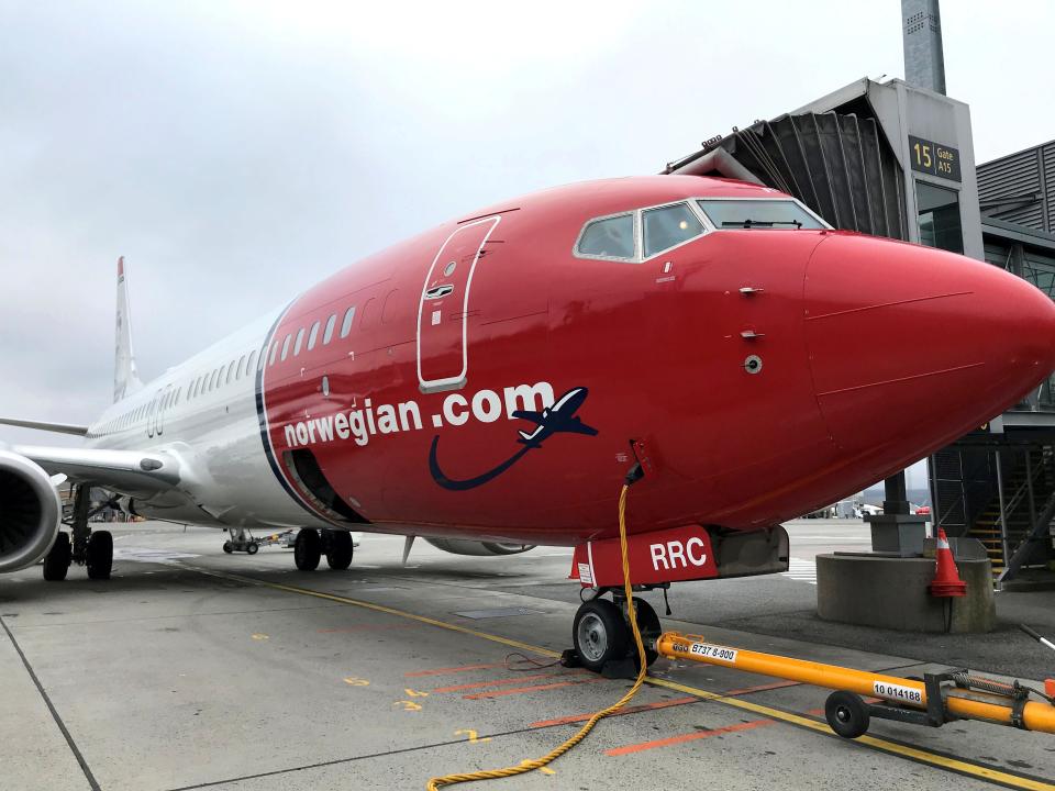FILE PHOTO: A Norwegian Air plane is refuelled at Oslo Gardermoen airport, Norway November 7, 2019. REUTERS/Lefteris Karagiannopoulos