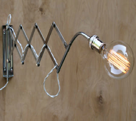 <div class="caption-credit"> Photo by: Etsy</div><b>Mid-century Accordian Wall Lamp</b> <br> For the more industrial vibe, your modern nursery can feature this unique lighting for reading or diaper changing (just make sure it is placed high out of Baby's reach). Thomas Edison would be proud! <br> <i><a rel="nofollow noopener" href="http://www.disneybaby.com/blog/10-lighting-ideas-for-a-boys-nursery/#slide8" target="_blank" data-ylk="slk:Get it here;elm:context_link;itc:0;sec:content-canvas" class="link ">Get it here</a></i> <br> <b><i><a rel="nofollow noopener" href="http://www.disneybaby.com/blog/6-baby-toys-you-already-have-in-your-own-kitchen/" target="_blank" data-ylk="slk:Related: 6 kitchen items my baby finds fascinating;elm:context_link;itc:0;sec:content-canvas" class="link ">Related: 6 kitchen items my baby finds fascinating</a></i></b>