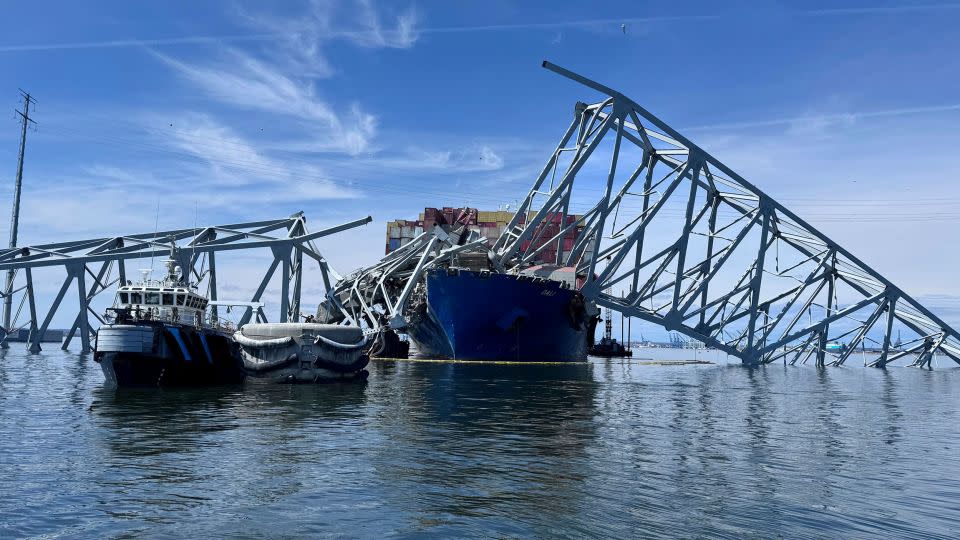Remnants of the Francis Scott Key Bridge in Baltimore are seen Sunday. Crews have embarked on the complicated operation of removing thousands of tons of steel and concrete. (AP Photos/Mike Pesoli) - Mike Pesoli/AP
