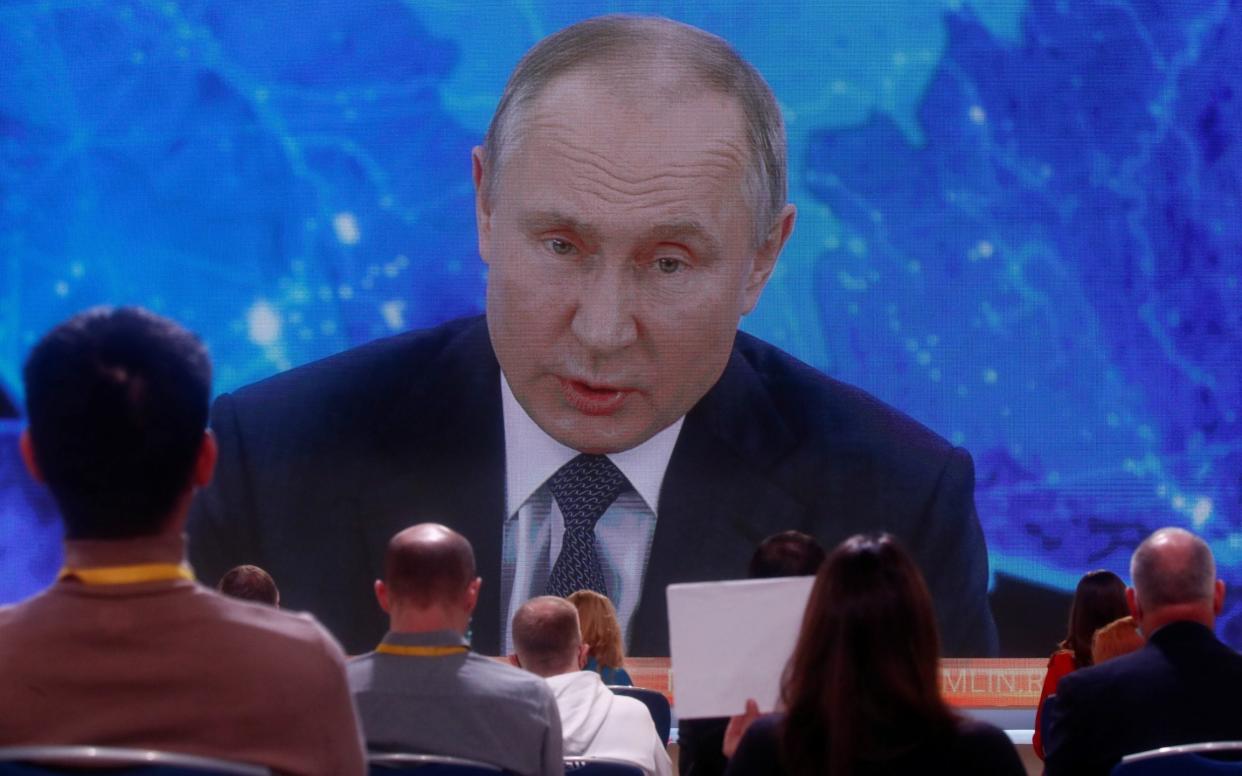 Vladimir Putin was speaking to journalists on Thursday via a video link - Maxim Shemetov/Reuters