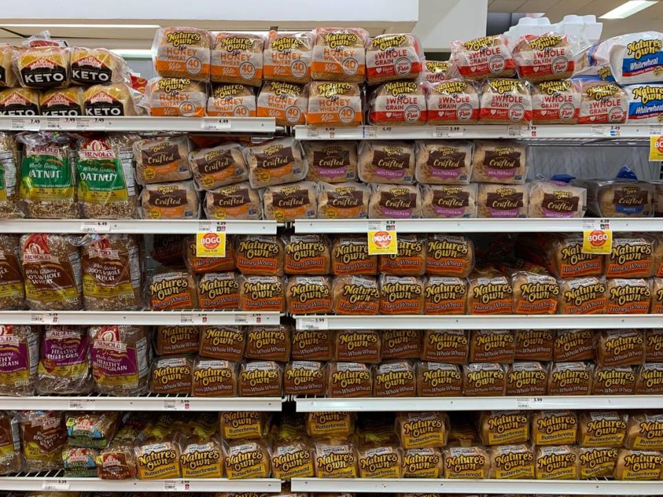 A wall of bread at a Doral Winn-Dixie in December 2022. Prices can vary from store to store as well as between chains.