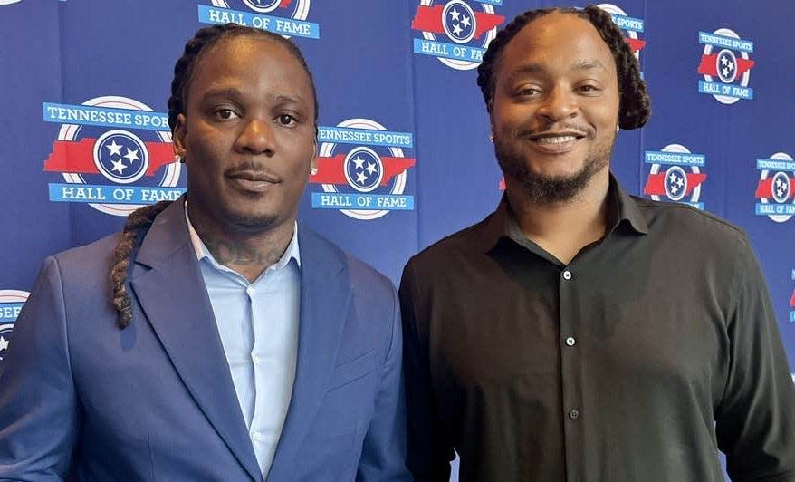 Former Tennessee Titans running back Chris Johnson, left, shown here with fellow former Titans running back and teammate LenDale White, was inducted into the Tennessee Sports Hall of Fame Saturday night at Omni Nashville Hotel.