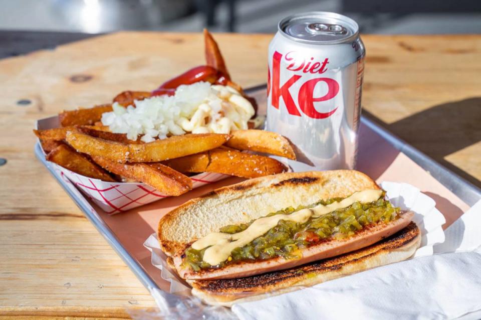 The Good Wurst Company’s House Frankfurter with spicy mustard and relish, Belgian Frites and a Diet Coke.