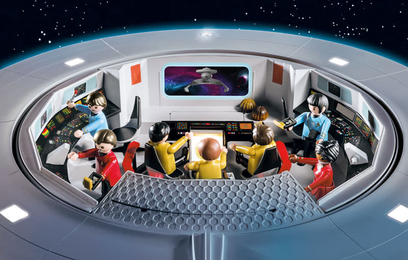 Image Playmobil Star Trek U.S.S. Enterprise set toy crew sitting in the command center of the Enterprise.