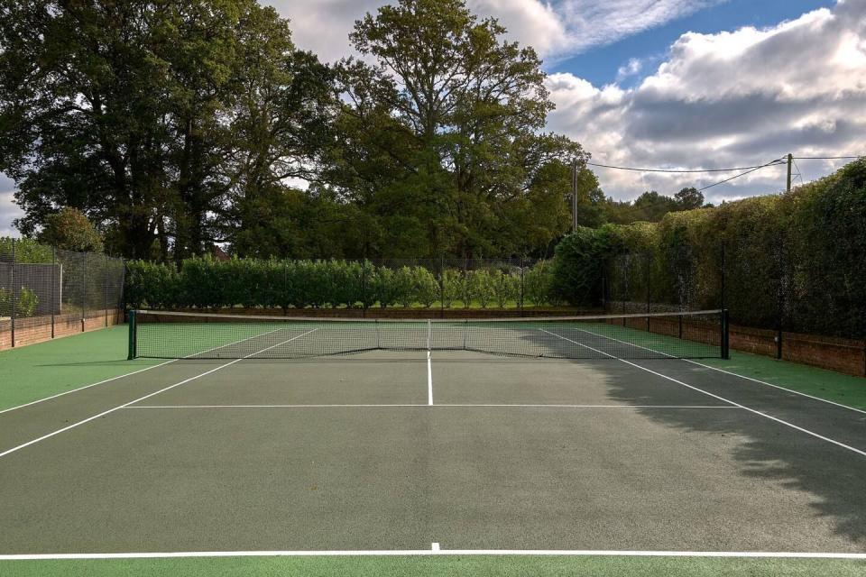 9) The cottage in Surrey with a tennis court