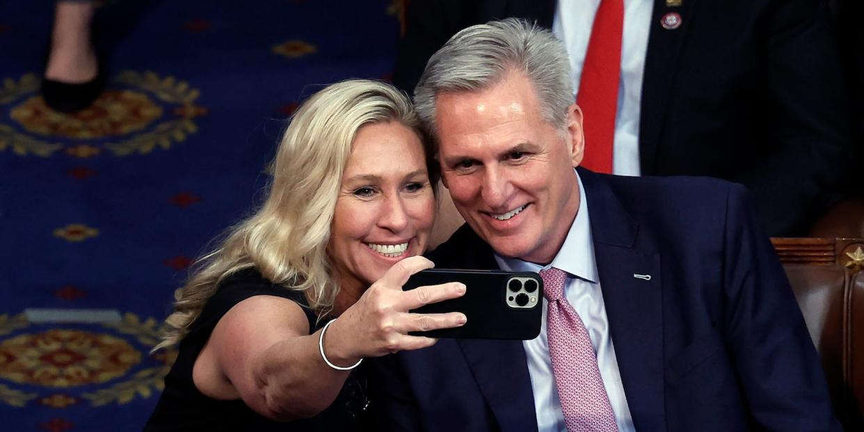 Republican Rep. Marjorie Taylor Greene of Georgia takes a selfie with Kevin McCarthy after his election as speaker of the House.