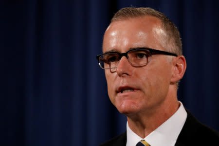 FILE PHOTO: Acting FBI Director Andrew McCabe announces the results of the national health care fraud takedown during a news conference at the Justice Department in Washington, U.S., July 13, 2017. REUTERS/Aaron P. Bernstein