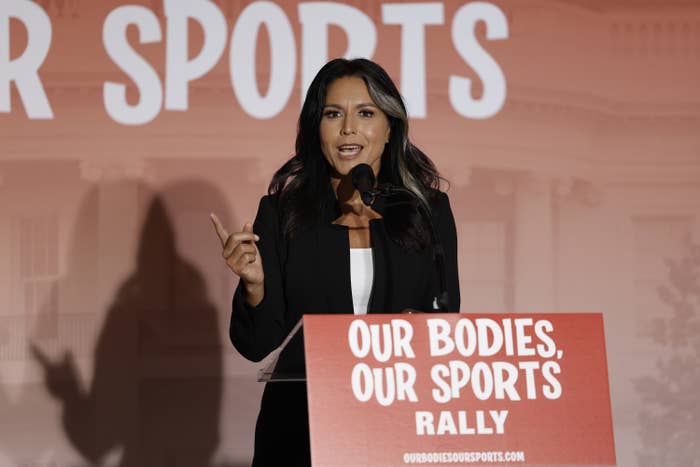 Tulsi Gabbard speaking at an event in June in Washington, DC, aimed at excluding transgender women from sports.