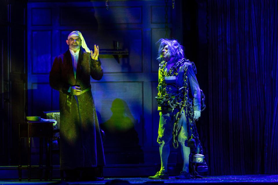 David Sitler and Jon J. Peterson appear as Scrooge and Marley in "A Christmas Carol" in 2021 at the Hanover Theatre for the Performing Arts.