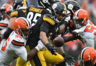 <p>Myles Garrett #95 of the Cleveland Browns forces a fumble by James Conner #30 of the Pittsburgh Steelers during the fourth quarter at FirstEnergy Stadium on September 9, 2018 in Cleveland, Ohio. (Photo by Jason Miller/Getty Images) </p>