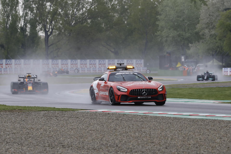 Red Bull driver Max Verstappen of the Netherlands follows the safety car during the Emilia Romagna Formula One Grand Prix, at the Imola racetrack, Italy, Sunday, April 18, 2021. (AP Photo/Luca Bruno)