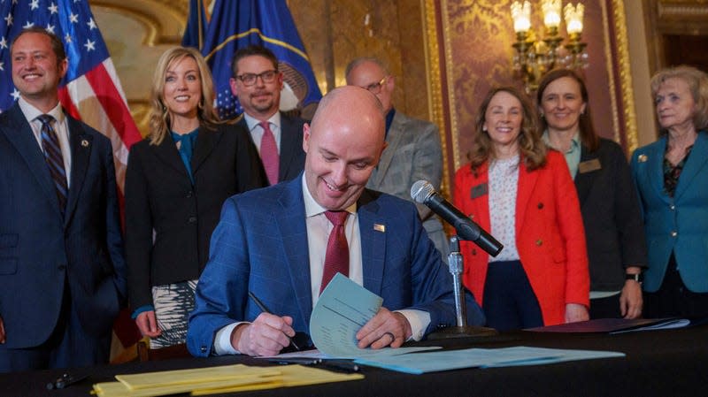 ov. Spencer Cox signs two social media regulation bills during a ceremony at the Capitol building in Salt Lake City on Thursday, March 23, 2023. 