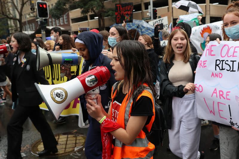 A 14-year-old activist participates in a rally demanding climate change action in Sydney