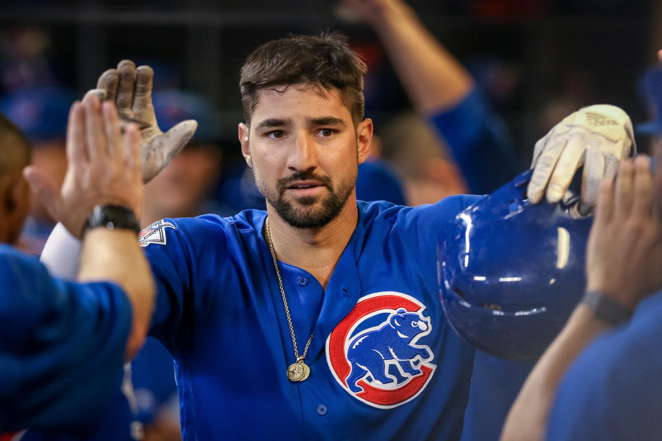 MILWAUKEE, WISCONSIN - SEPTEMBER 05:  Nicholas Castellanos #6 of the Chicago Cubs celebrates with teammates after scoring a run in the fifth inning against the Milwaukee Brewers at Miller Park on September 05, 2019 in Milwaukee, Wisconsin. (Photo by Dylan Buell/Getty Images)