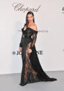 On May 23, model Adriana Lima became the latest A-lister to wear the ultra thigh-split dress in a lace off-the-shoulder dress by Ester Abner. <em>[Photo: Getty]</em>