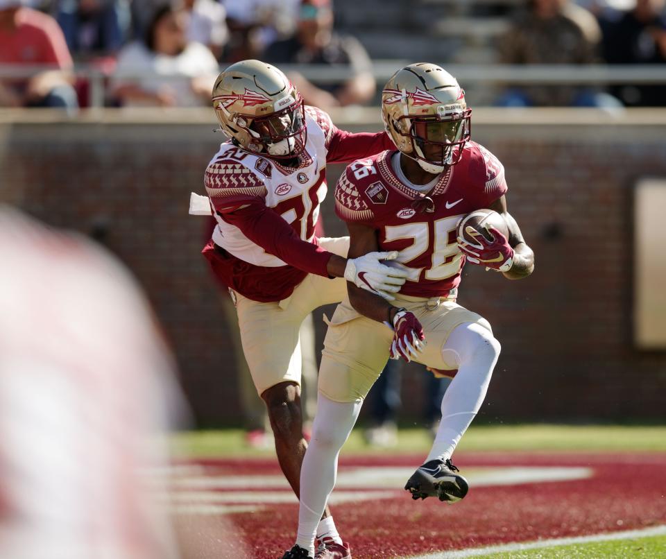 Florida State Seminoles defensive back Kevin Knowles II (26) intercepts a pass. The Florida State Seminoles hosted their annual Garnet and Gold spring game at Doak Campbell Stadium on Saturday, April 9, 2022.