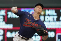 Minnesota Twins pitcher Griffin Jax throws to a Cleveland Indians batter during the first inning of a baseball game Wednesday, Sept. 15, 2021, in Minneapolis. (AP Photo/Jim Mone)
