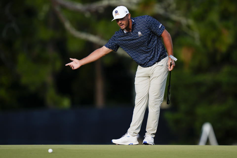 Bryson DeChambeau reacts after missing a putt on the eighth hole during the first round of the U.S. Open golf tournament Thursday, June 13, 2024, in Pinehurst, N.C. (AP Photo/Frank Franklin II )