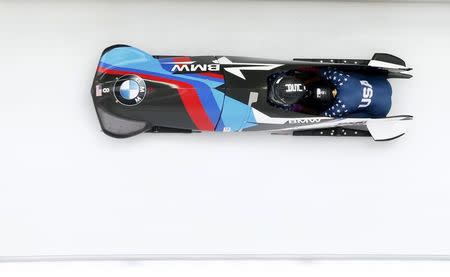 Bobsleigh - BMW IBSF Bob & Skeleton World Championships - Women Bobsleigh third heat - Koenigssee, Germany - 18/2/17 - Elana Meyers Taylor and Kehri Jones of USA in action. REUTERS/Arnd Wiegmann