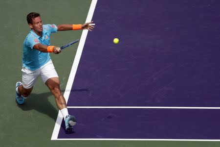 Mar 30, 2017; Miami, FL, USA; Tomas Berdych of the Czech Republic hits a forehand against Roger Federer of Switzerland (not pictured) in a men's singles quarter-final during the 2017 Miami Open at Crandon Park Tennis Center. Federer won 6-2, 3-6, 7-6(6). Mandatory Credit: Geoff Burke-USA TODAY Sports