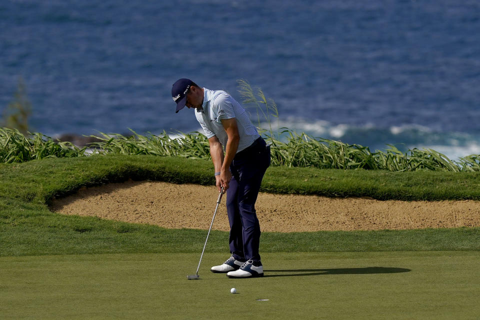 Justin Thomas putts on the 12th green during third round of the Tournament of Champions golf event, Saturday, Jan. 4, 2020, at Kapalua Plantation Course in Kapalua, Hawaii. (AP Photo/Matt York)