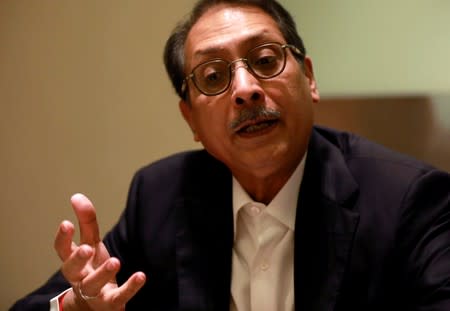 Aloke Lohia, CEO of Indorama Ventures, talks during a Reuters interview at hotel at Bangkok