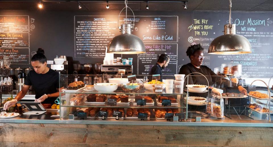 Employees working in a cafe.