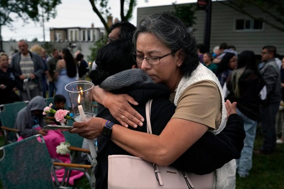 A relative of victim Nicholas Toledo is comforted at a vigil on Wednesday night (Copyright 2022 The Associated Press. All rights reserved)