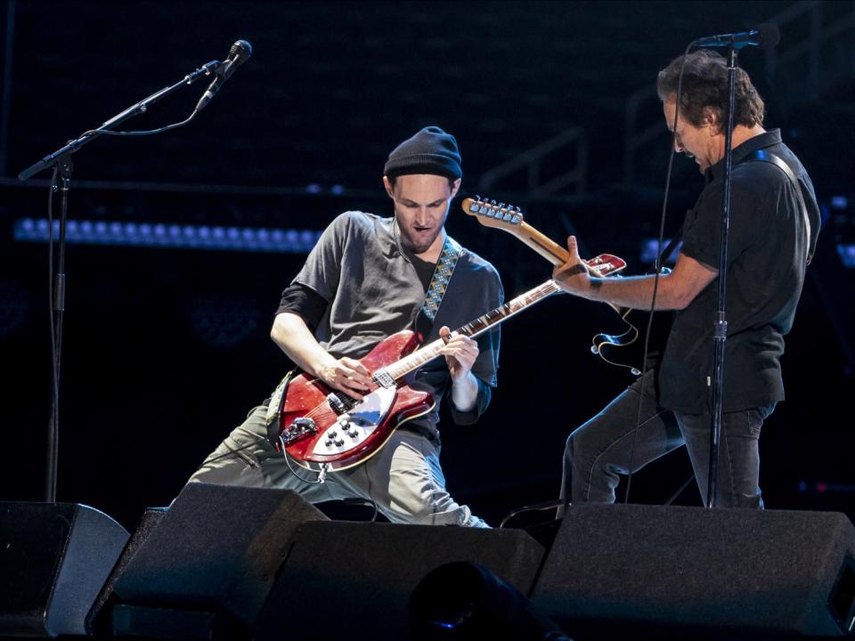 Josh Klinghoffer and Eddie Vedder play together at the Vax Live concert