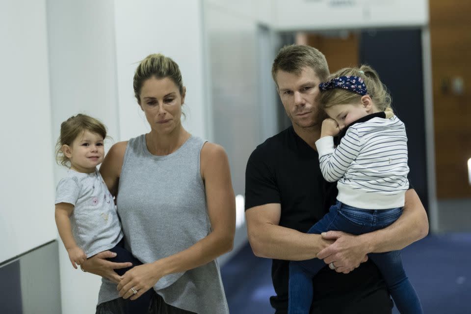 David and Candice Warner with their daughters Ivy and Indi at Sydney airport. Source: Getty