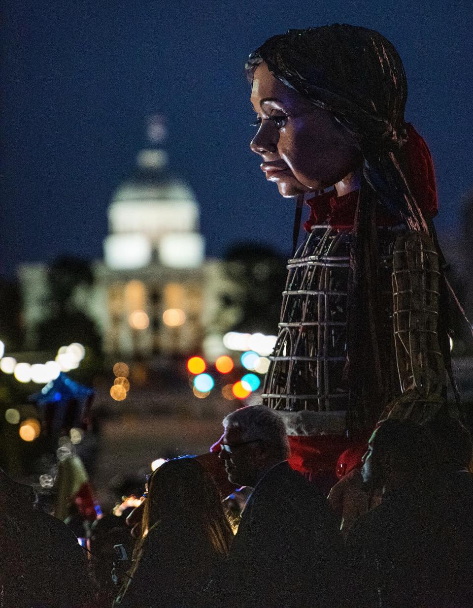 Little Amal, a 12-foot-tall puppet of a refugee Syrian girl, walked in Montgomery the week of Oct. 13. Each night night, her walk symbolized something different, but overall, Amal is used to bring people together.