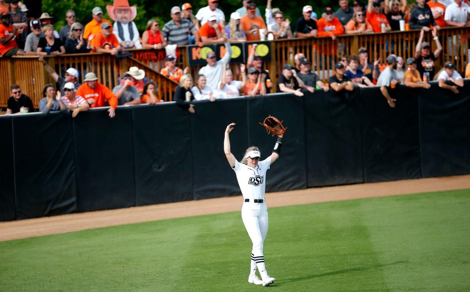 Oklahoma State's Chelsea Alexander (55) celebrates in the seventh inning of a 2-0 win against Texas last May 30 in the NCAA Super Regional in Stillwater.