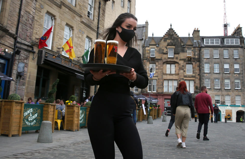 Pubs could once again sell alcohol indoors as well as out of doors if Scotland moves to Level 2 restrictions. (Andrew Milligan/PA)