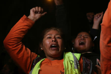 Supporters of Keiko Fujimori, daughter of former president Alberto Fujimori and leader of the opposition in Peru, protest against her detention in Lima, Peru October 15, 2018. REUTERS/ Guadalupe Pardo