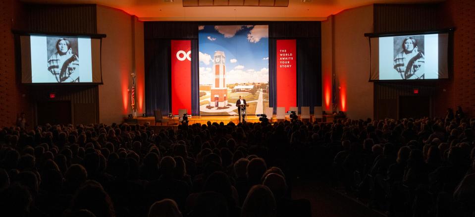 Photos of Mollie Burkhart appear on screens as David Grann presents his lecture Tuesday at Oklahoma Christian University, which hosted several sessions featuring the "Killers of the Flower Moon" author and others.